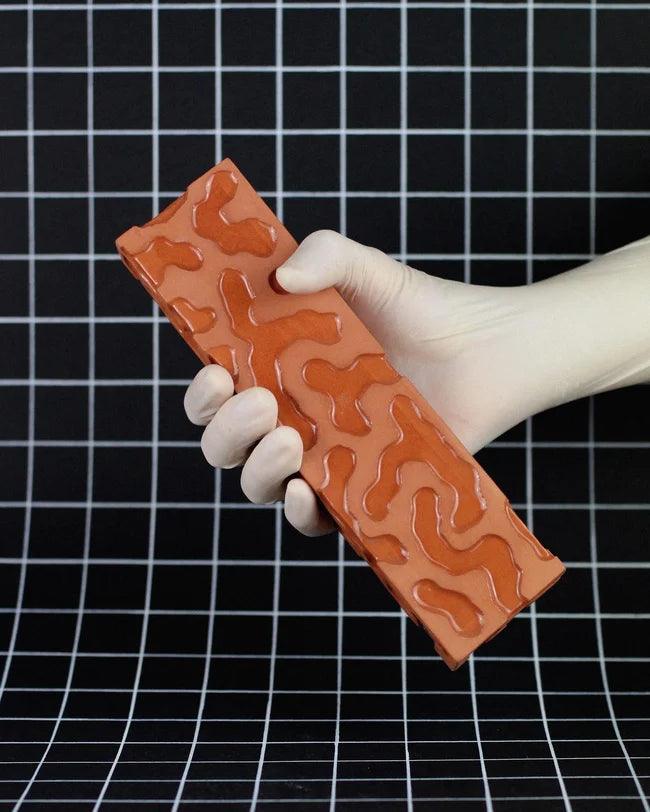 Sculptural hand craved brick - MINX Factory